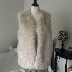 Errand running drinks with friends dinner party faux fur vest